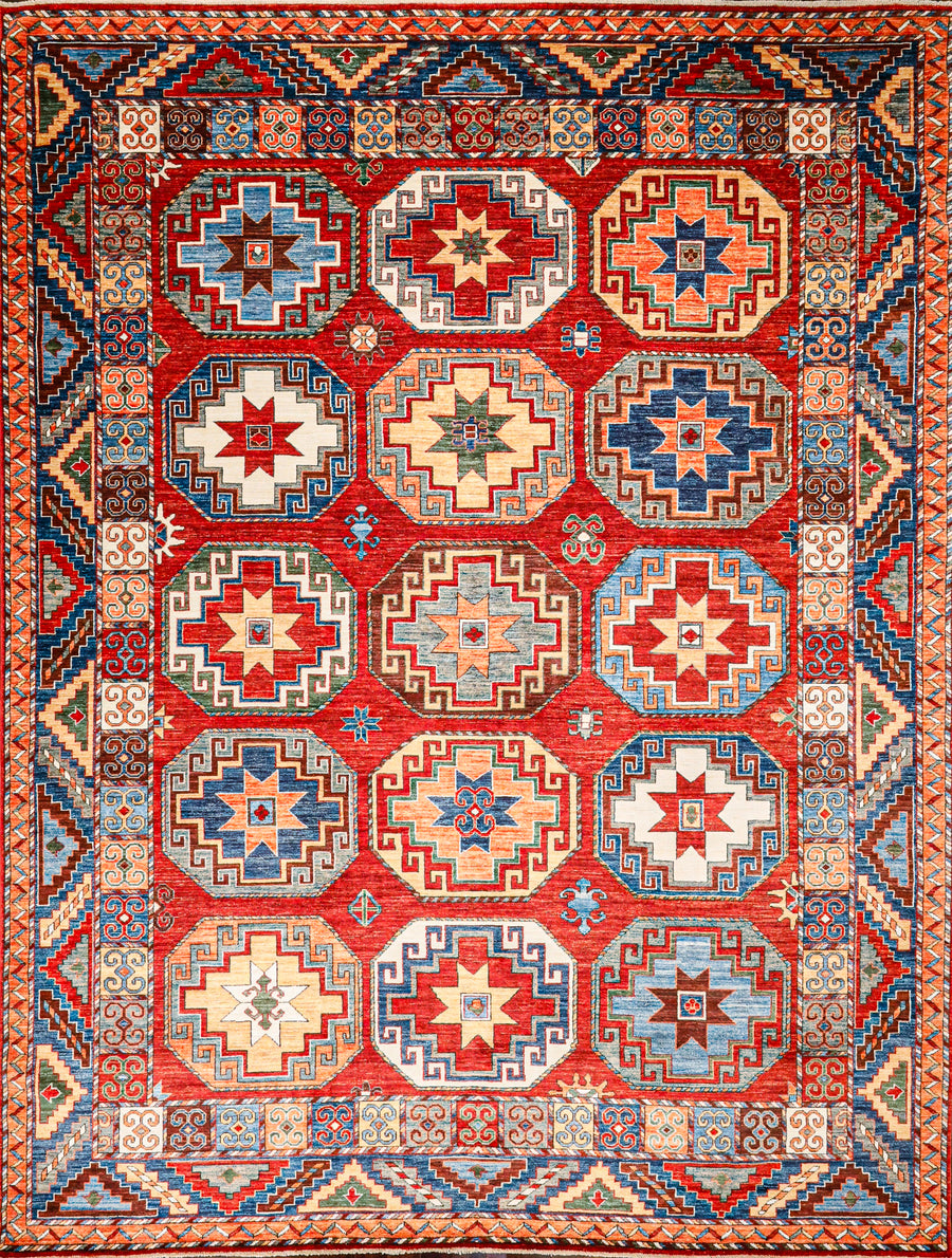 Handmade Wool 9x12 Area Rug With Colorful Octagonal Gul Designs in a Red Central Area. 