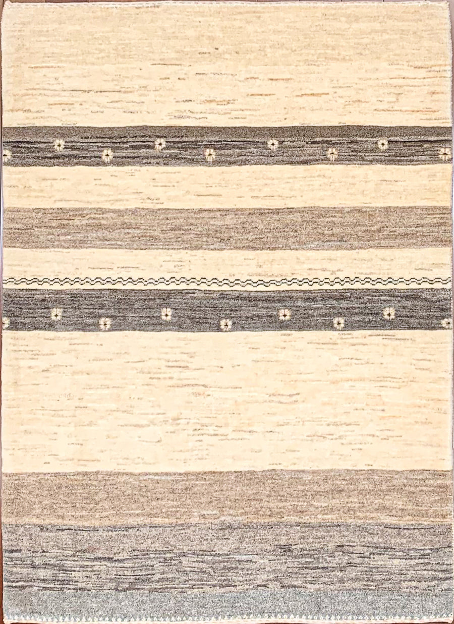 Rustic Persian Gabbeh throw rug hand-knotted in undyed wool.