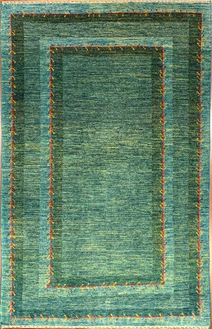 Green Tribal Gabbeh handmade in Southern Iran.