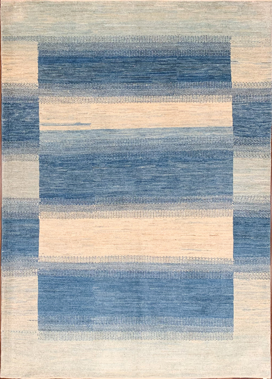 Hand knotted 5x7 Gabbeh rug woven in Southern Iran with indigo dyed stripes against undyed wool.