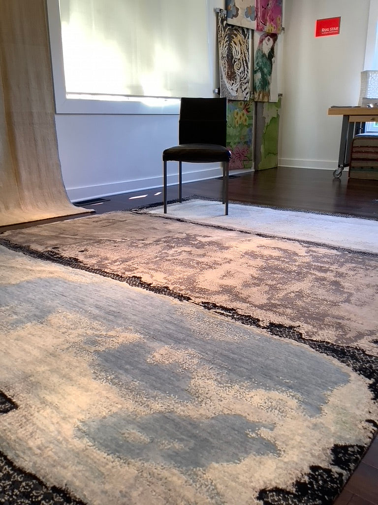 modern-rug-with-leather-chair-on-hardwood-floor