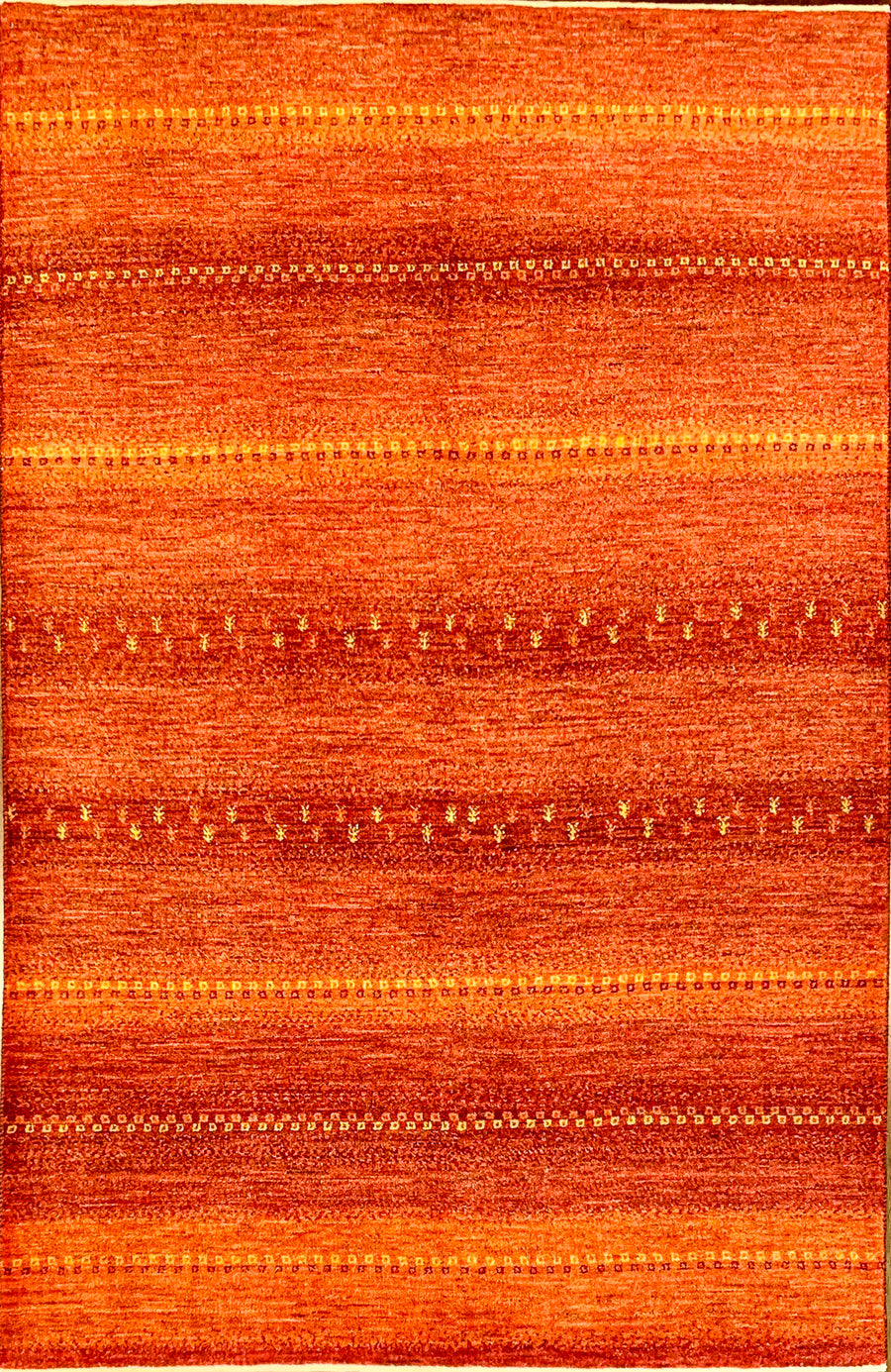 Small 4x6 Tribal Persian Gabbeh Made in Red and Amber Colors.