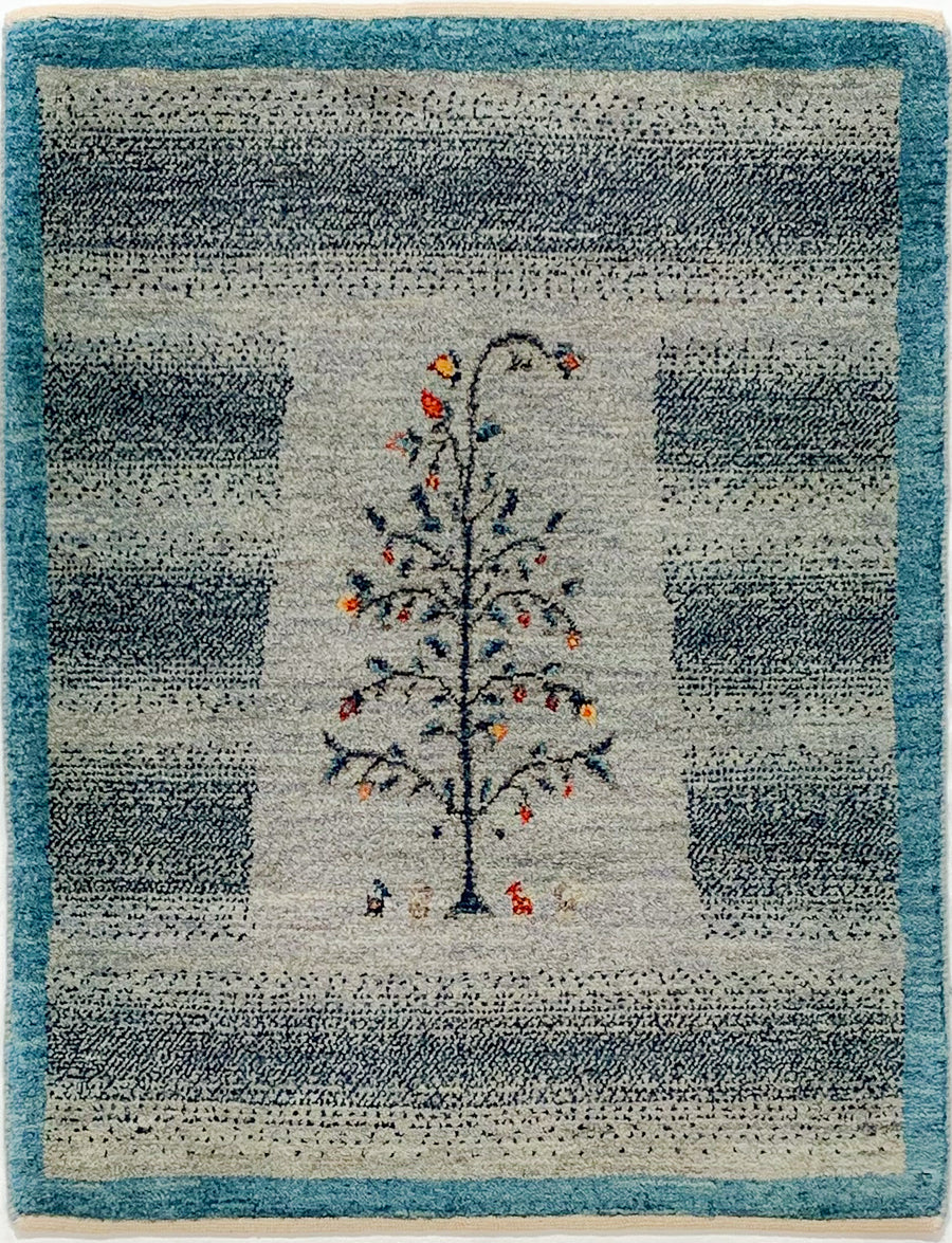 Small Gabbeh Throw Rug With Christmas tree image and Blue Border.