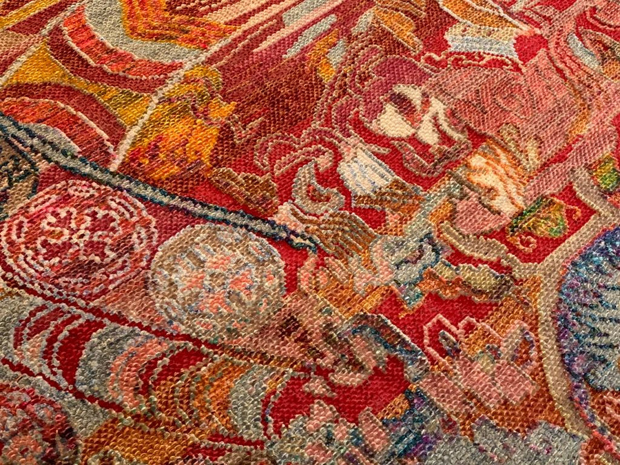 Close up of Brightly colored modern 8x10 rug showing knots