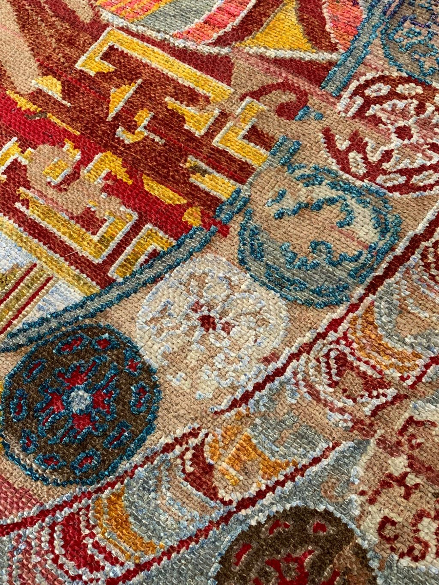 Close up of Brightly colored modern 8x10 rug 