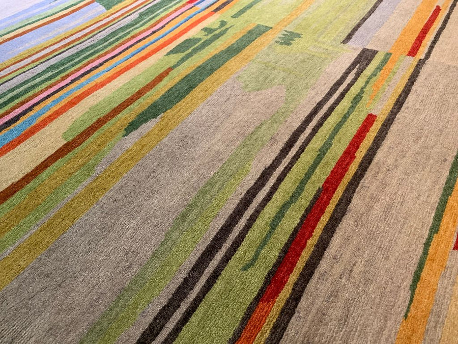 Detail of Handmade Nepalese 9x12 Rug with colorful stripes 