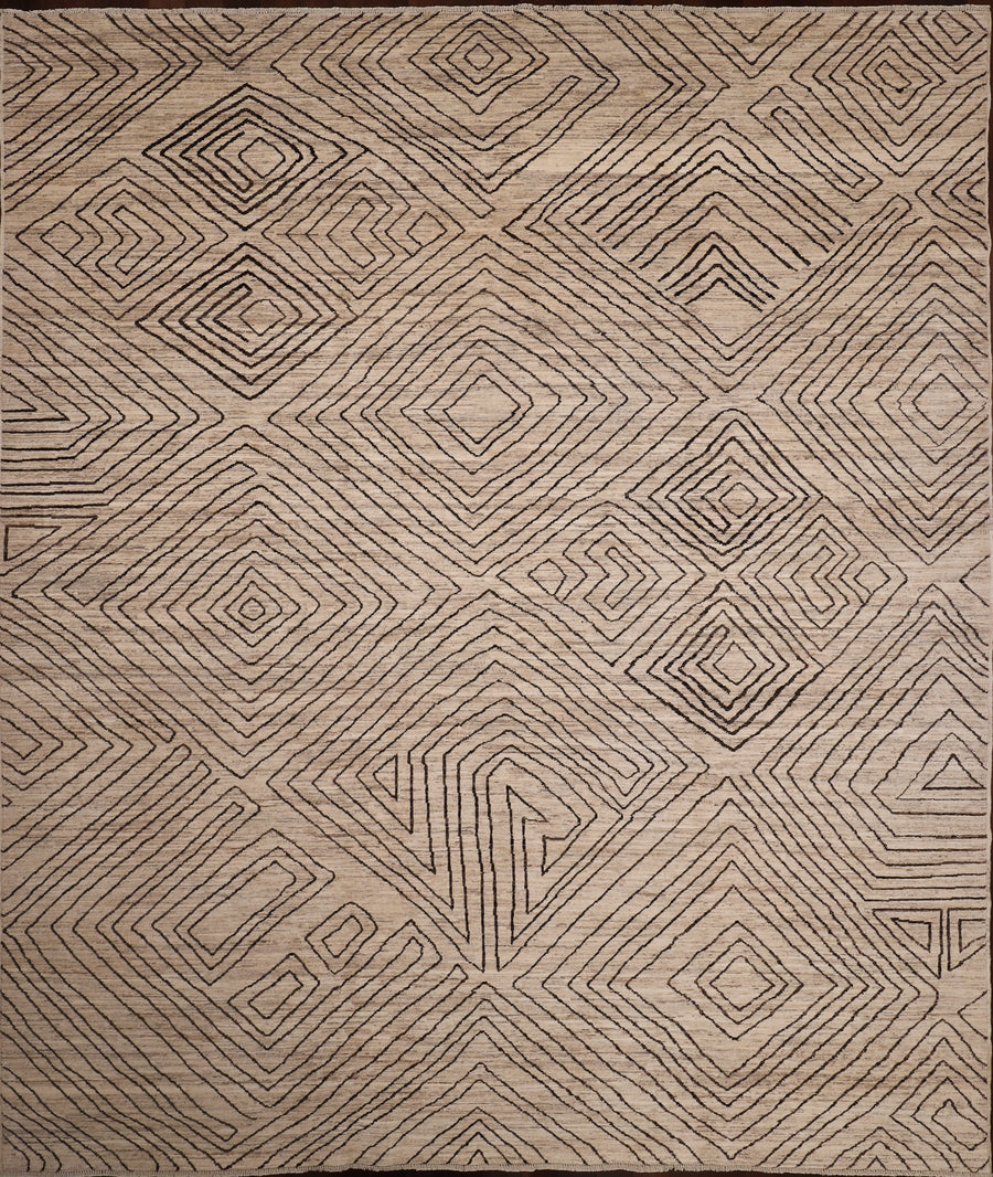 Handmade 8x10 rug knotted in neutral tones and designed by Christiane Millinger in Portland Oregon. 