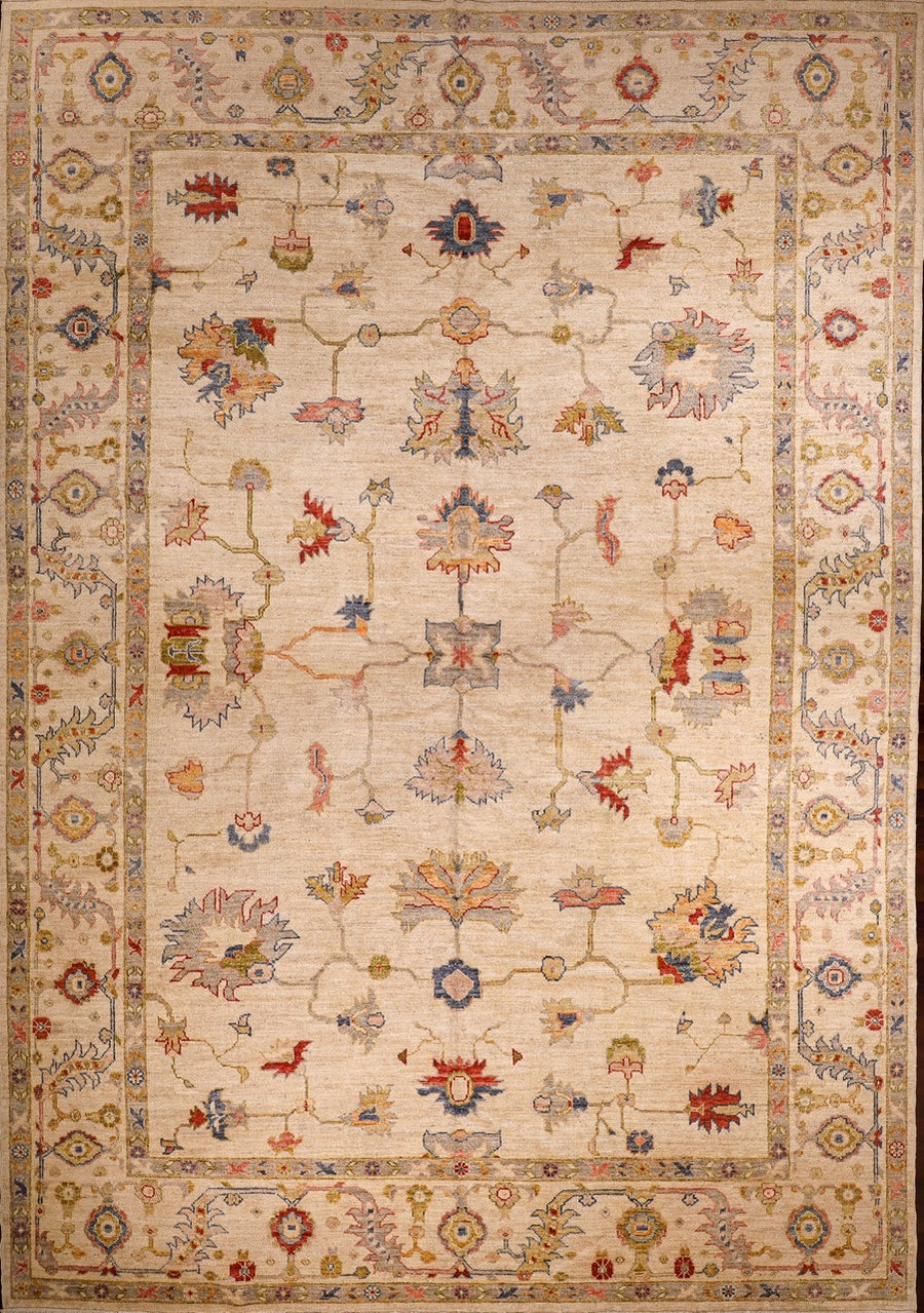 Handmade Angora Wool large sized area rug with beige, olive, blue, red, and gold colors.