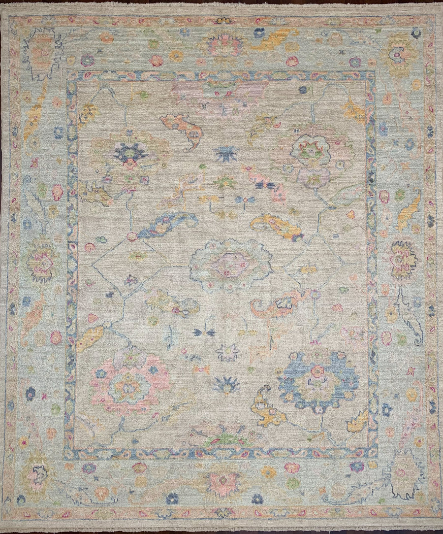 Handmade Angora wool Ushak 8x10 rug in soft pastel colors. 