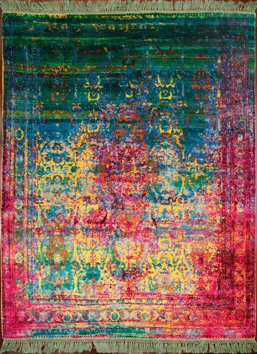 The NewNew No. 03 from Rug Star. This stunningly colorful 8x10 rug features a spectrum of colors hand-knotted in the highest quality silk.